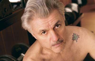 John Irving and his maple leaf tattoo