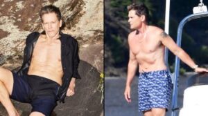 “Kevin Bacon shirtless outdoors showing faded shoulder tattoo while relaxing on rocks”